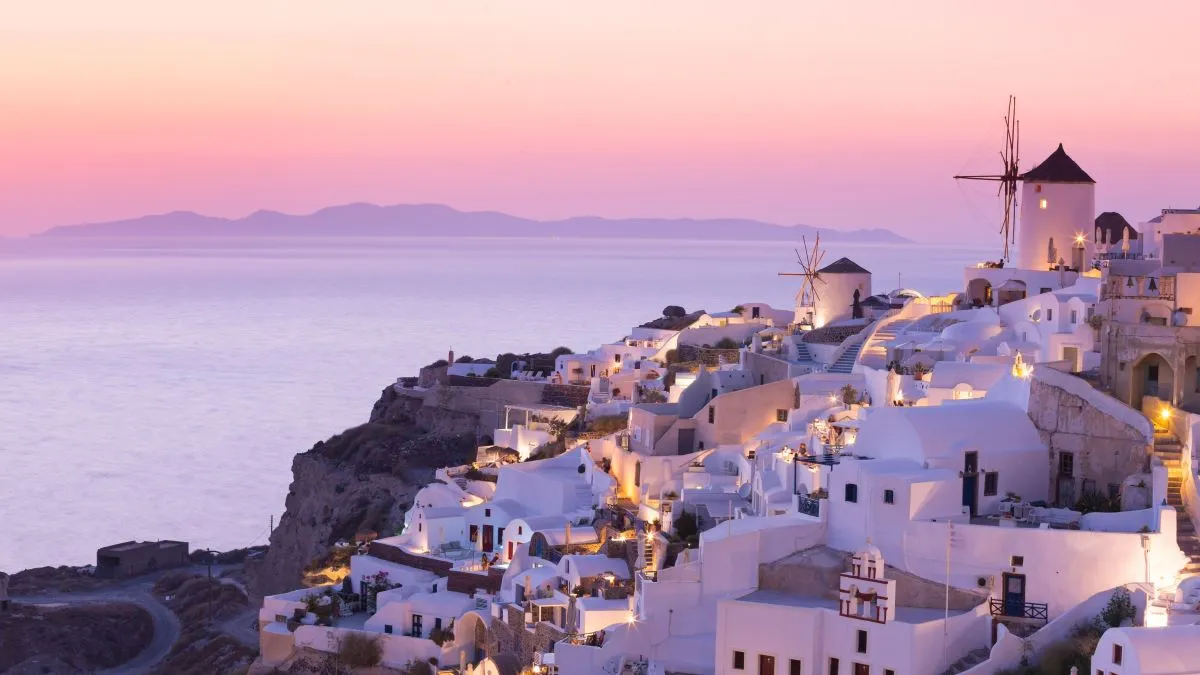 View over a Greek island village at sunset